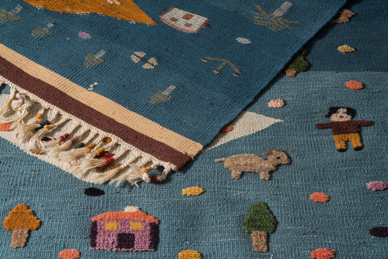 Closeup blue MiniKnots kids rug